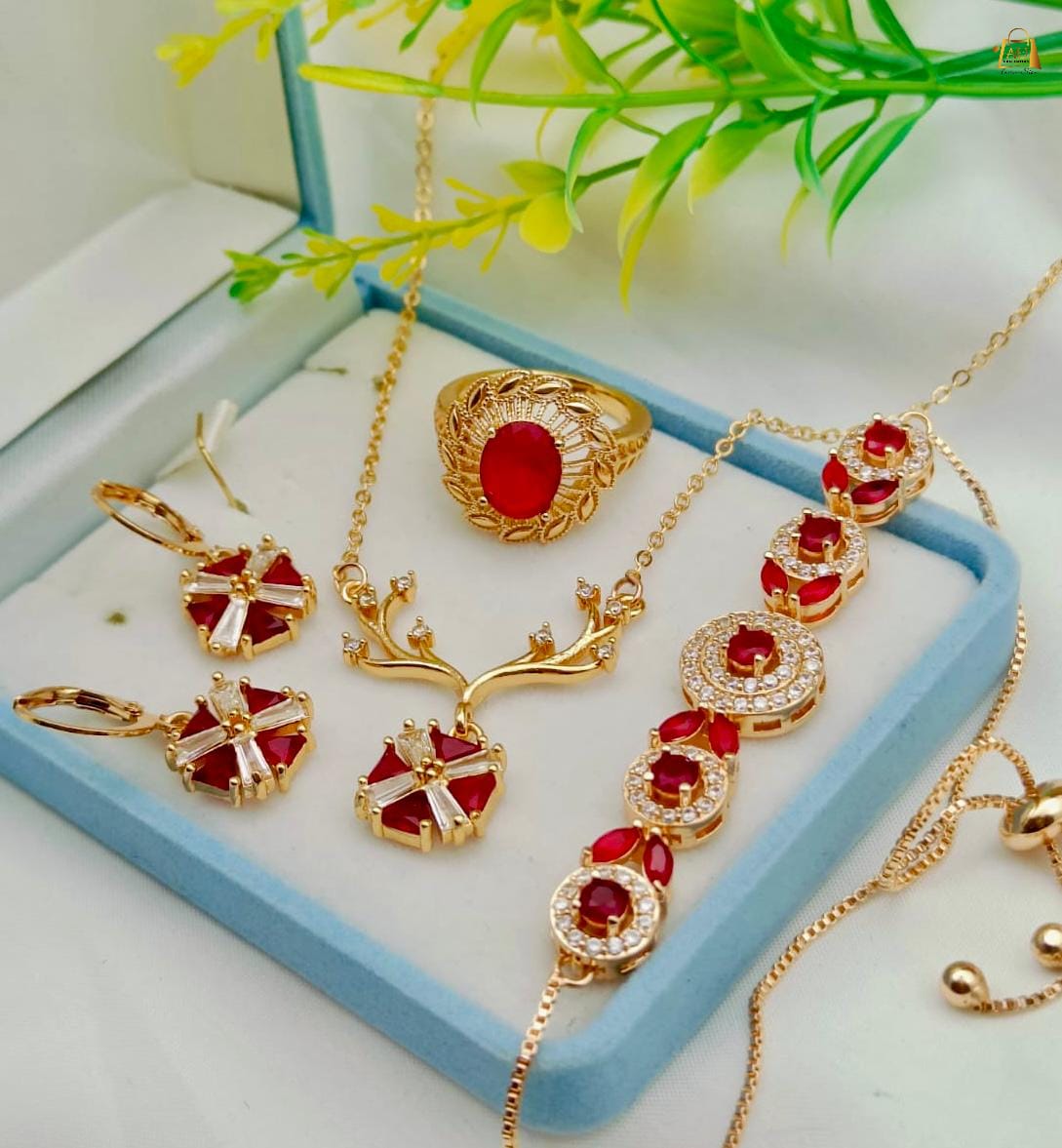 High Quality Zircon Combo Set  Available in red colour locket with bracelet & ring
