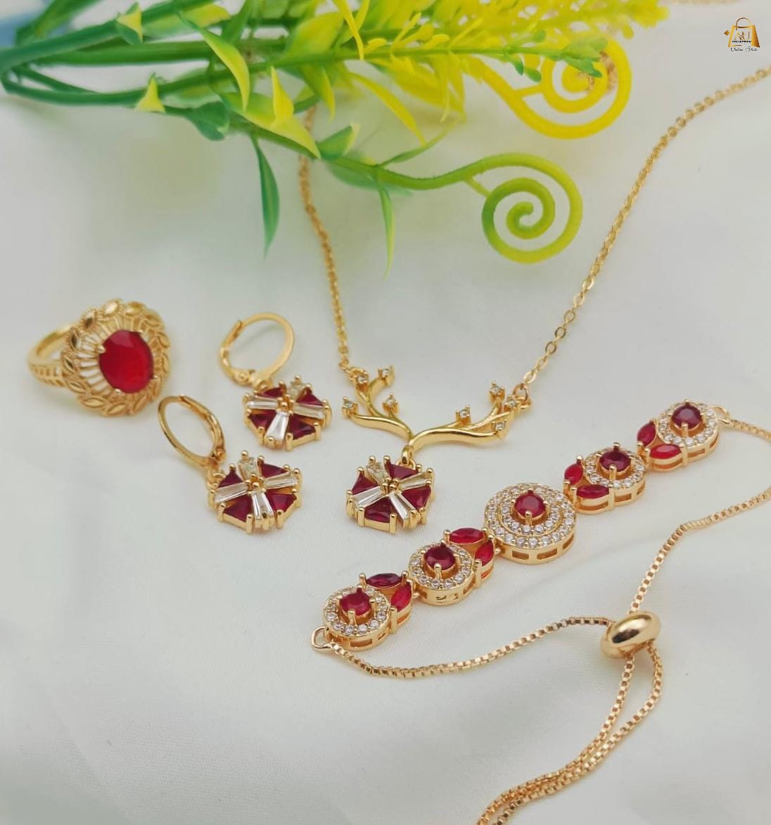 High Quality Zircon Combo Set  Available in red colour locket with bracelet & ring